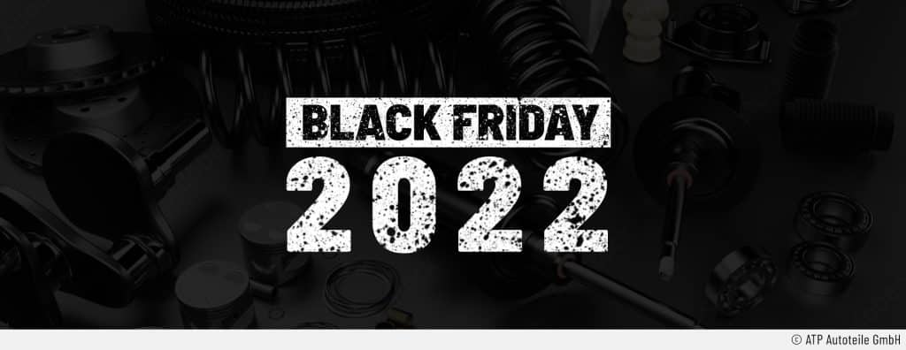 Auf dem Headerbild sticht der Schriftzug Black Friday 2022 in coolem steinigen Design vor einem schwarzen Hintergrund, auf dem Autoteile durchschimmern.