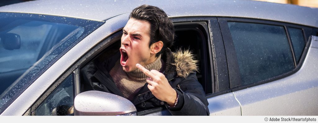 Wütender Mann, Der Auto Fährt Und Mittelfinger Zeigt Lizenzfreie